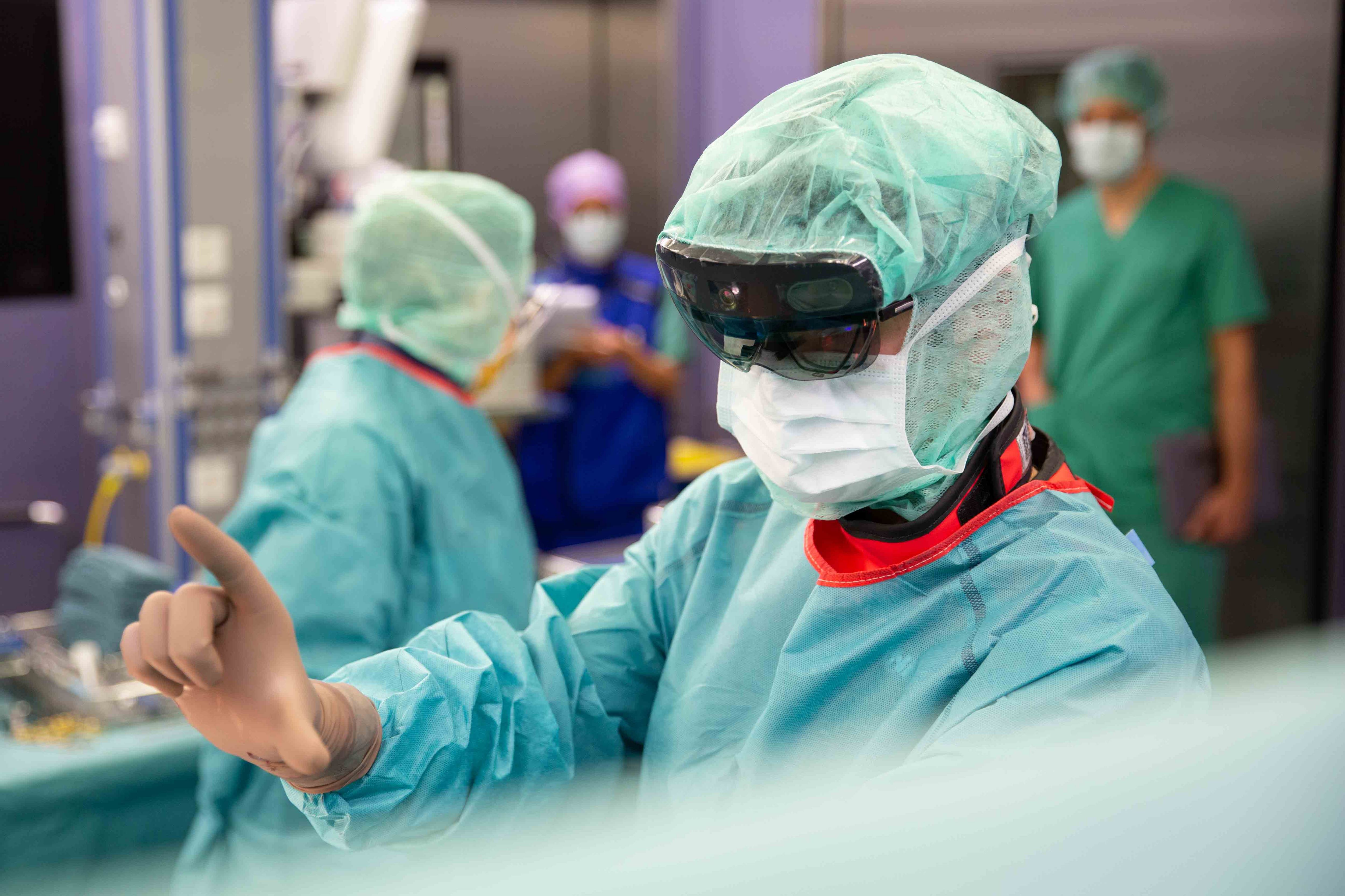 Prof. Farshad in the operating room wearing AR glasses.