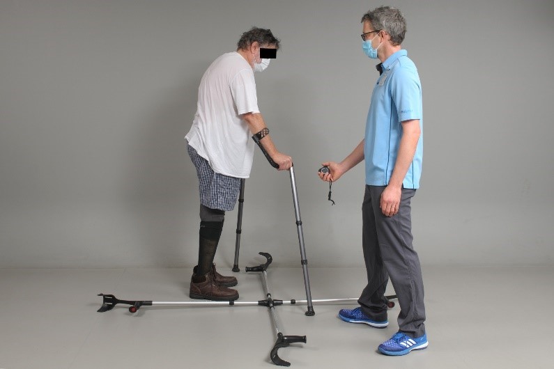 Patient tries out different walking aids with therapist.